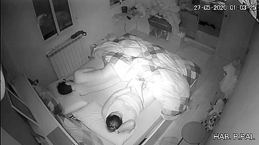 Mother and son in the same bed, a hidden camera caught her masturbating while he sleeps