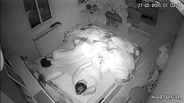 Mother and son in the same bed, a hidden camera caught her masturbating while he sleeps