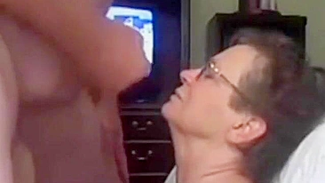 Mom makes her son cum on her face, she wants to brag about this video to her friends.