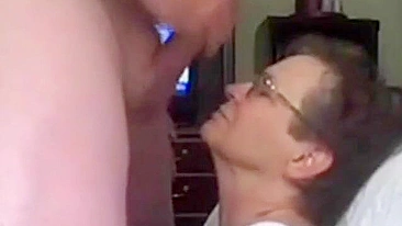 Mom makes her son cum on her face, she wants to brag about this video to her friends.