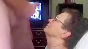 Mom makes her son cum on her face, she wants to brag about this video to her friends.