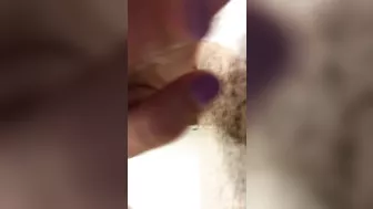 Absolutely super brunette with tanned nude body teasing on camera