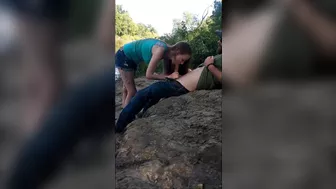 She is sucking dick by the lake