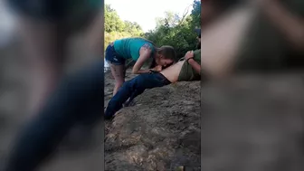 She is sucking dick by the lake