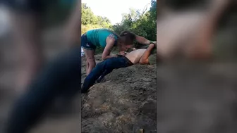 She is sucking dick by the lake