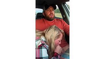 Husband receives a blowjob in car from wife while driving