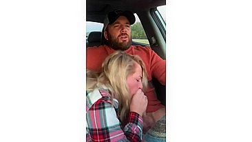 Husband receives a blowjob in car from wife while driving