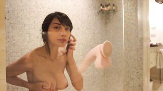 Gorgeous Asian woman having deep penetration with her dildo toy