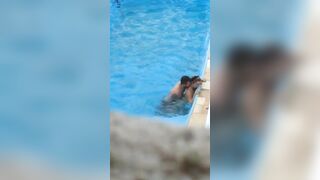 Horny couple makes sex in public swimming pool while hidden voyeur records