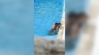 Horny couple makes sex in public swimming pool while hidden voyeur records