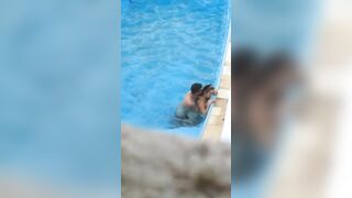 Horny couple makes sex in public swimming pool while hidden voyeur records