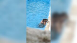 Horny couple makes sex in public swimming pool while hidden voyeur records