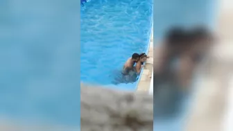 Horny couple makes sex in public swimming pool while hidden voyeur records