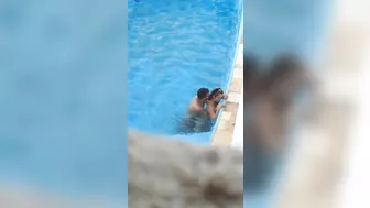 Horny couple makes sex in public swimming pool while hidden voyeur records