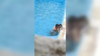 Horny couple makes sex in public swimming pool while hidden voyeur records Horny couple makes sex in public swimming pool while hidden voyeur records