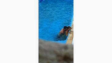 Horny couple makes sex in public swimming pool while hidden voyeur records