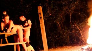 Amateur couple makes sex outdoor by the campfire