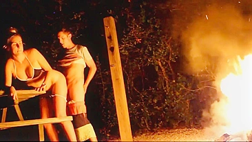 Amateur couple makes sex outdoor by the campfire