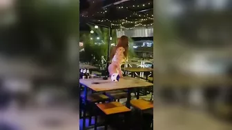 Thailand woman performer flashing pussy and ass in public bar
