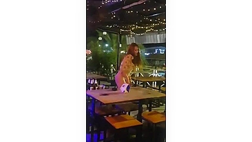 Thailand woman performer flashing pussy and ass in public bar