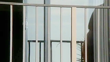 Hot naked woman on hotel balcony caught voyeur