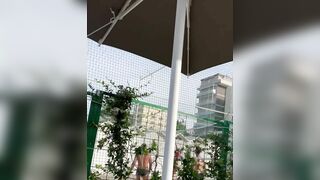 Horny girlfriend with no panties flashing pussy at the terrace