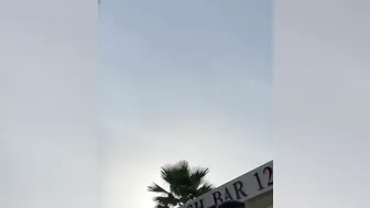 Horny girlfriend with no panties flashing pussy at the terrace