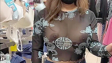 Superb wife with big tits wearing see through blouse in store revealing her nipples