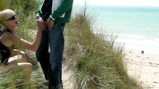 Public Handjob With Cumshot At The Beach Sneakily Hidden In The Bushes