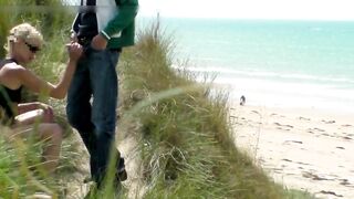 Public Handjob With Cumshot At The Beach Sneakily Hidden In The Bushes