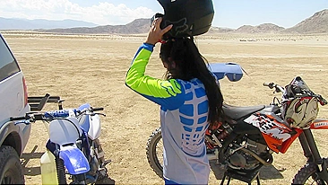 Sexy wife riding motorcycle stops in the desert with husband to have oral sex
