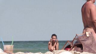 Nude woman with fantastic natural boobs filmed voyeur at beach