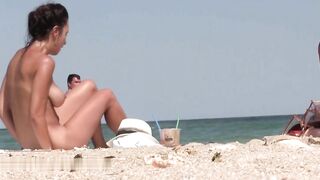 Nude woman with fantastic natural boobs filmed voyeur at beach