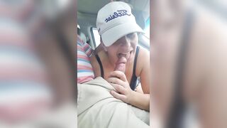 Husband gets a blowjob from wife while driving the car