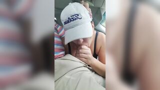 Husband gets a blowjob from wife while driving the car