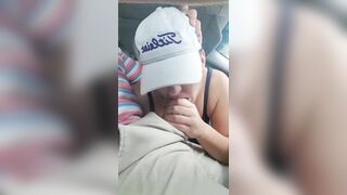 Husband gets a blowjob from wife while driving the car