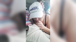 Husband gets a blowjob from wife while driving the car