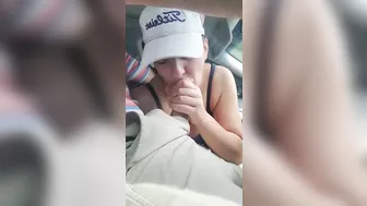 Husband gets a blowjob from wife while driving the car