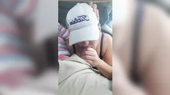 Husband gets a blowjob from wife while driving the car