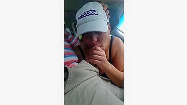 Husband gets a blowjob from wife while driving the car