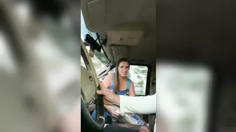 Gorgeous wife sucking cock of husband in the car while he drives