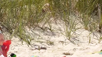Topless German mom at the beach
