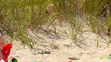 Topless German mom at the beach