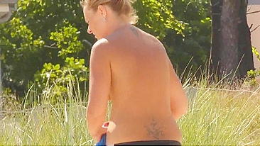 Topless German mom at the beach