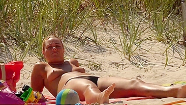 Topless German mom at the beach