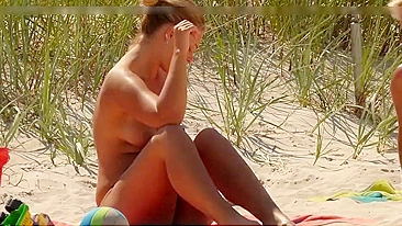 Topless German mom at the beach