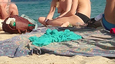 Topless girls filmed voyeur at public beach in Barcelona