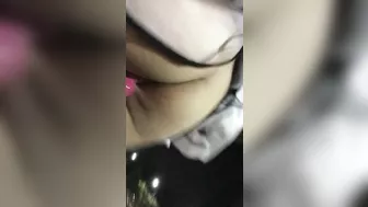 Girl walking down the public street with dildo balls in pussy