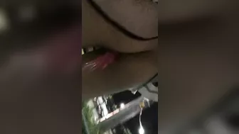 Girl walking down the public street with dildo balls in pussy