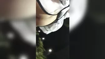 Girl walking down the public street with dildo balls in pussy